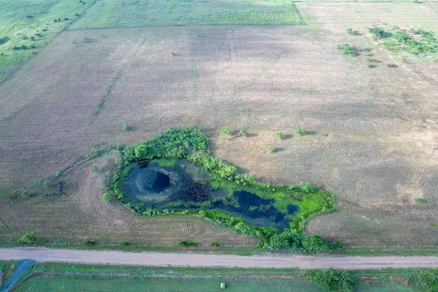 Aerial view of the pond and cleared land on Tract 5, La Grange, Texas.